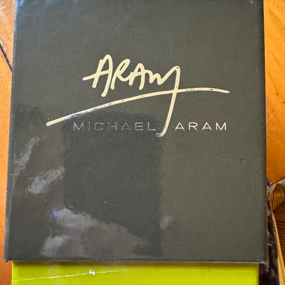 Michael Aram, beautiful candle in glass. Three wick. Fig leaf sent.